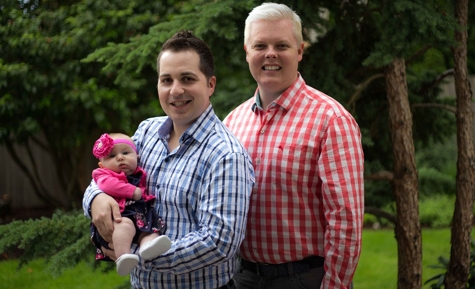 Seattle area gay couple with baby through reproductive specialist